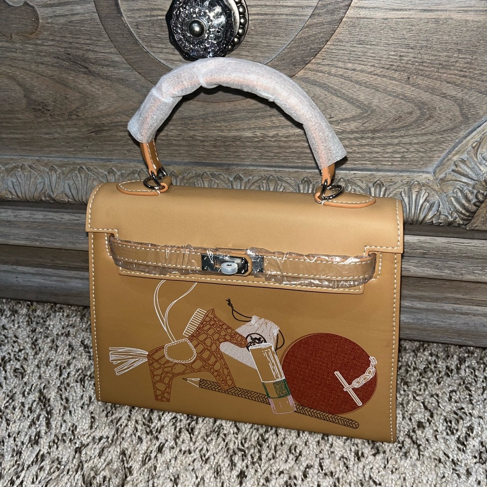 Elegant Tan Handbag with Artistic Design
